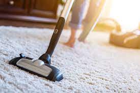 Vacuuming carpet